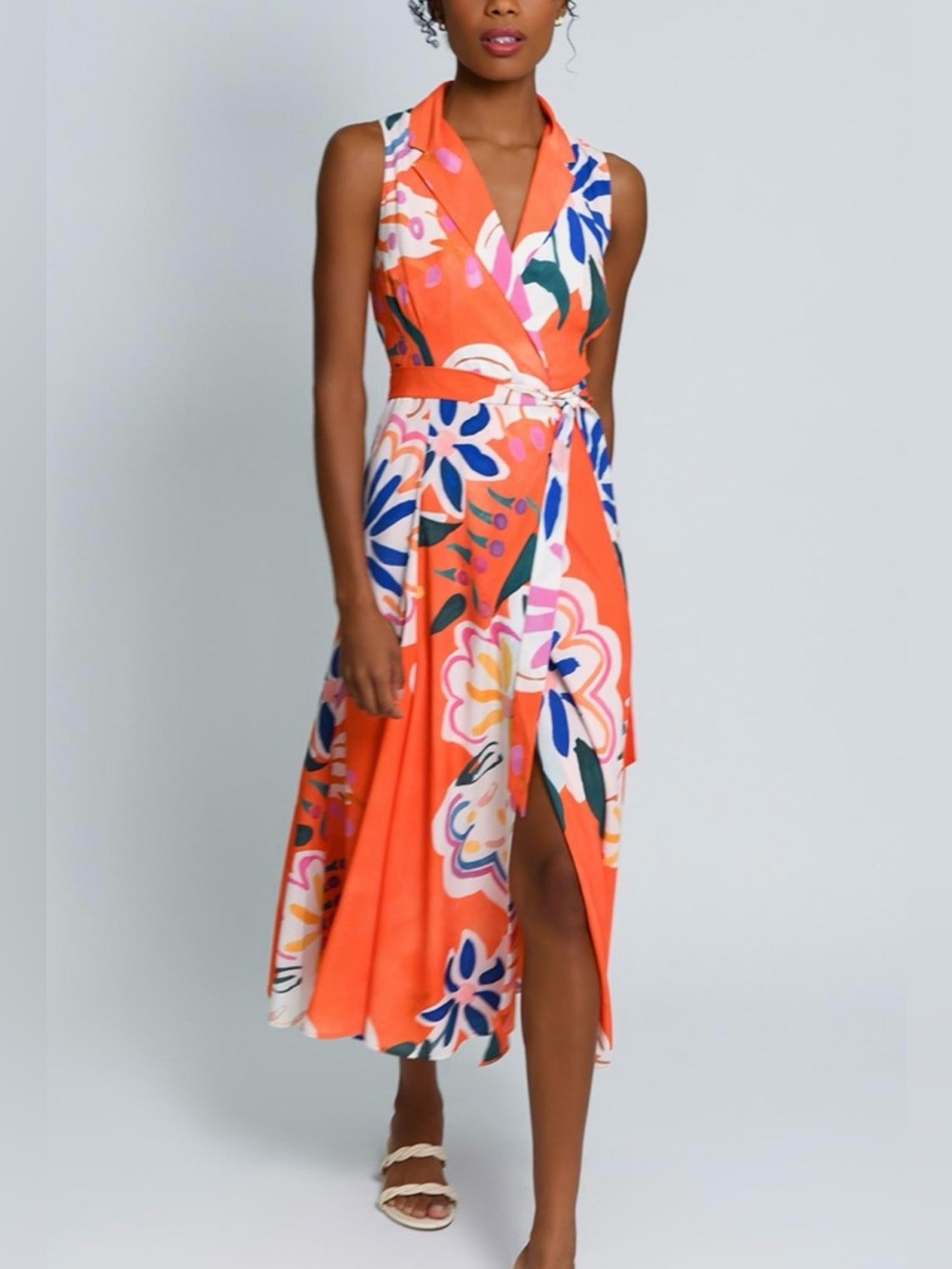 Hutch "Velva" sleeveless collared wrap midi dress.